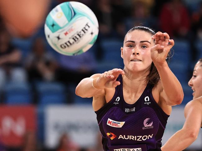 SYDNEY, AUSTRALIA - MARCH 22: Macy Gardner of the Firebirds passes the ball  during the 2024 Suncorp Team Girls Cup match between Melbourne Mavericks and Queensland Firebirds at Ken Rosewall Arena on March 22, 2024 in Sydney, Australia. (Photo by Jenny Evans/Getty Images for Netball Australia)