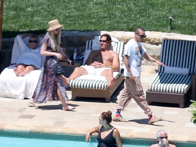 Ashlee Simpson and Evan Ross seen relaxing by the pool a day before Jessica Simpsons wedding in Santa Barbara.