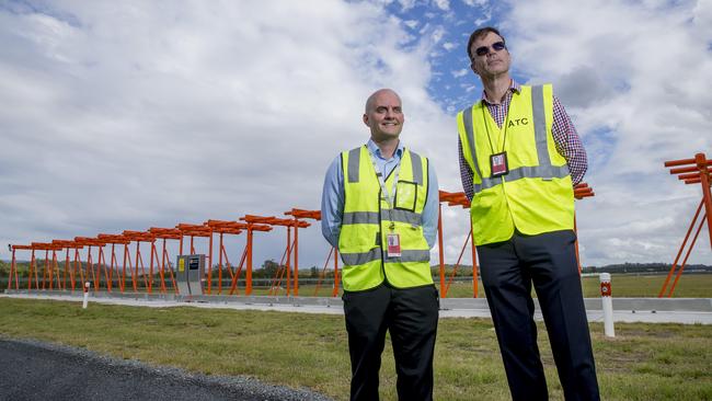 Service Delivery General Manager Brett Curtis and Airservices Australia Northern Operations Manager Doug Scott GC Airport Operations. Picture: Jerad Williams