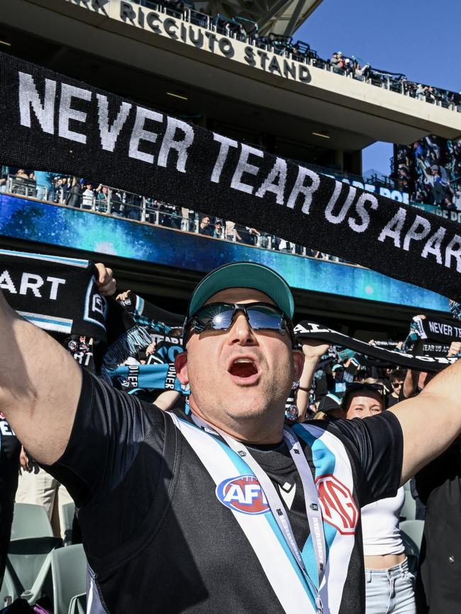 Port faithful singing Never Tear Us Apart before the first bounce at Adelaide Oval. Photo by Mark Brake/Getty Images