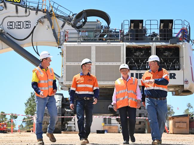 Charters Towers Mayor Frank Beveridge (left), Bravus Mining and Resources CEO David Boshoff, Townsville Mayor Jenny Hill and Whitsunday Mayor Andrew Willcox at the Carmichael Mine ahead of first exportation of coal. Picture: Contributed