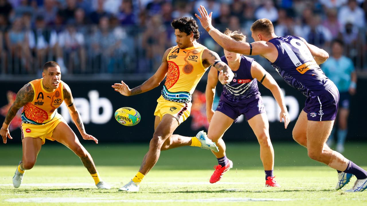 Tim Kelly of the Indigenous All Stars kicks the ball during the 2025 Toyota AFL Indigenous All Stars match between the Indigenous All Stars and the Fremantle Dockers at Optus Stadium on February 15in Perth. Picture: Dylan Burns/AFL Photos via Getty Images