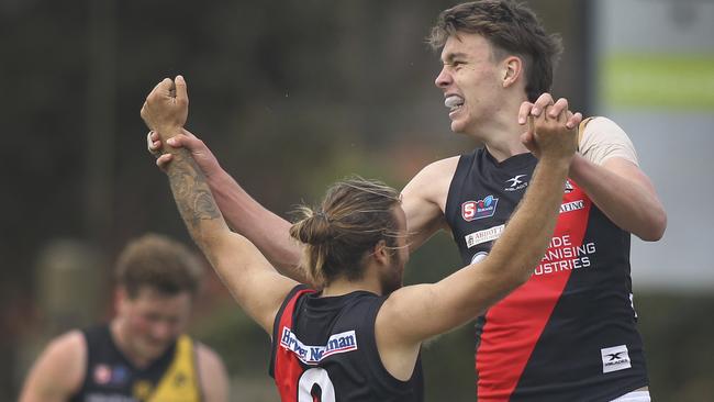 West Adelaide young gun Riley Thilthorpe, right, celebrates a goal with teammate Kenny Karpany in his fifth senior appearance. Picture: Dean Martin/AAP