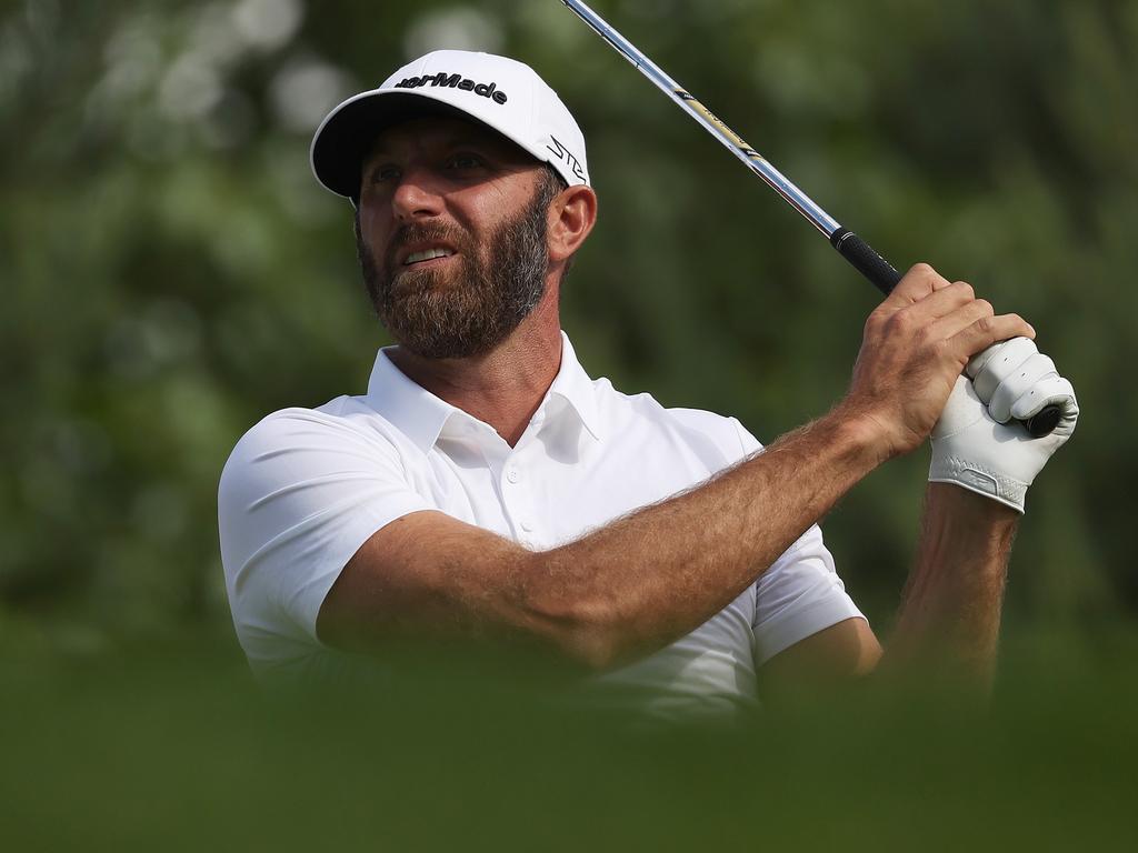 Dustin Johnson tees off on the 14th hole during the LIV Invitational at The Centurion Club, as one of the breakaway golf series’ marquee recruits. Picture: Matthew Lewis/Getty Images