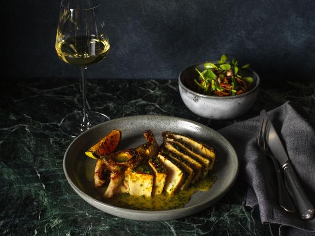 Coal-grilled swordfish T-bone with burnt orange and saffron, and extra virgin olive oil from Shane Delia’s Layla. Picture: Jason Loucas