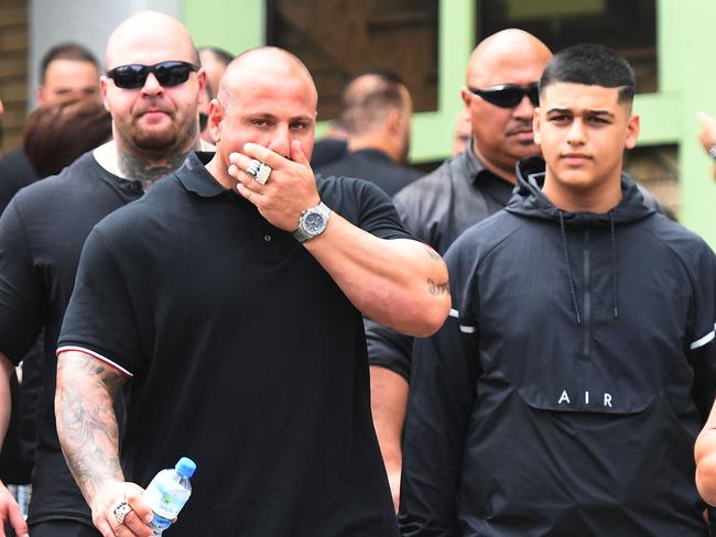 Mourners leave after the funeral for Mick Hawi. Picture: AAP