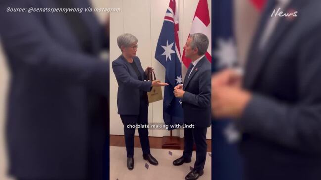 Penny Wong gives 'cheeky' gift to Swiss politician