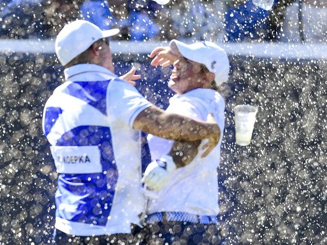 ADELAIDE, AUSTRALIA - APRIL 23: Chase Koepka of the Smash celebrates a hole in one with his caddie on the 12th showered in beer from the crowd during day three of Liv Golf Adelaide at The Grange Golf Course on April 23, 2023 in Adelaide, Australia. (Photo by Mark Brake/Getty Images)