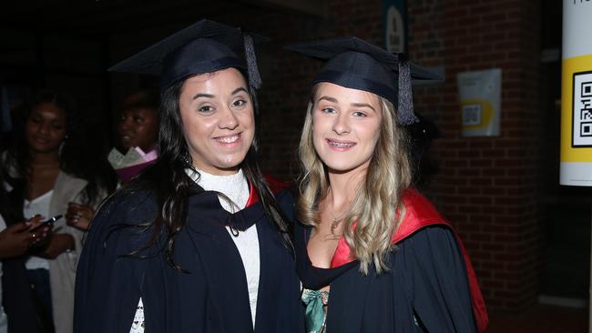 Angelina Pitasi and Olivia Douglas celebrate graduation. Picture: Alan Barber