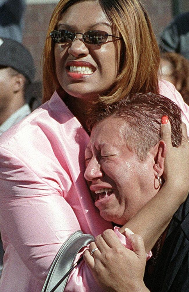 Two women hold each other as they watch the World Trade Centre burn following the September 11 terrorist attack on the twin skyscrapers in New York.