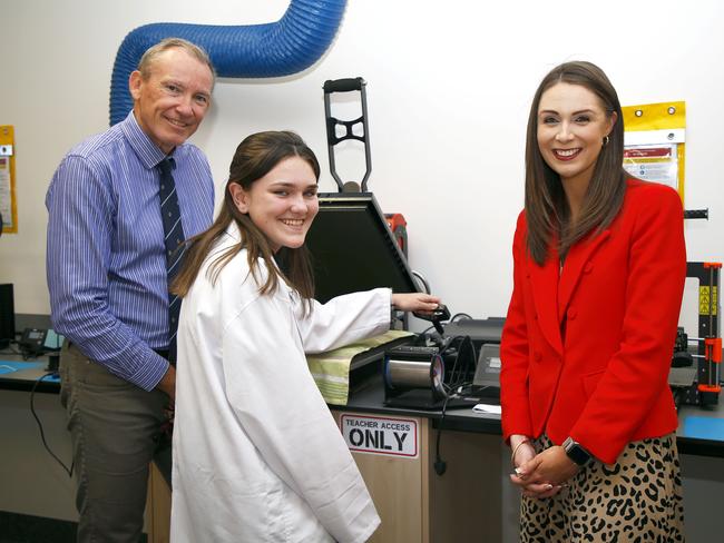 School principal Mark Peggrem, student Frankie Hinds and Gaven MP Meaghan Scanlon at the opening of the new $25 million junior learning precinct at Pacific Pines State High School. Photo: Tertius Pickard.