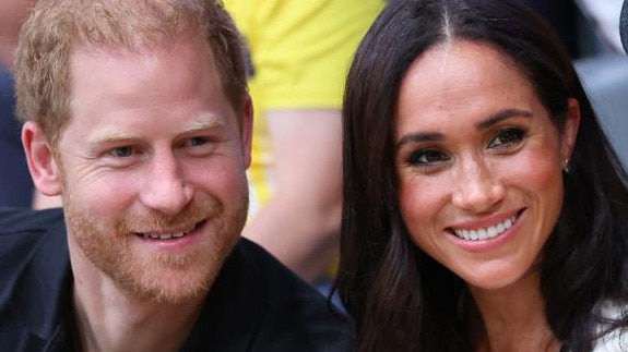 DUESSELDORF, GERMANY - SEPTEMBER 13: Prince Harry, Duke of Sussex and Meghan, Duchess of Sussex pose for a photograph as they attend the Wheelchair Basketball preliminary match between Ukraine and Australia during day four of the Invictus Games Düsseldorf 2023 on September 13, 2023 in Duesseldorf, Germany. (Photo by Chris Jackson/Getty Images for the Invictus Games Foundation)