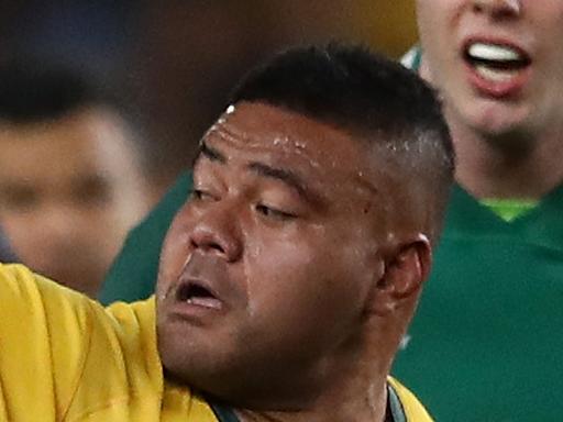 SYDNEY, AUSTRALIA - JUNE 23: Tolu Latu of the Wallabies offloads the ball during the Third International Test match between the Australian Wallabies and Ireland at Allianz Stadium on June 23, 2018 in Sydney, Australia.  (Photo by Cameron Spencer/Getty Images)