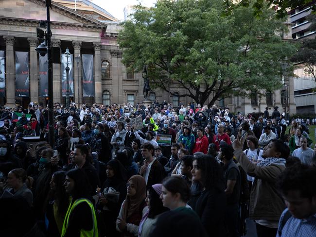 Attendees show their support for Palestinians. Picture: Andrew Henshaw