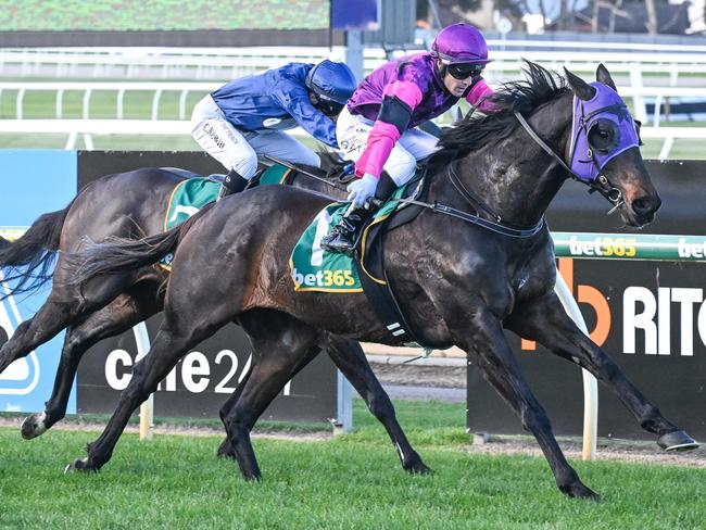 Rolling Moss ridden by Logan Bates wins the Prestige Jayco BM58 Handicap at Geelong Racecourse on June 06, 2024 in Geelong, Australia. (Reg Ryan/Racing Photos via Getty Images)