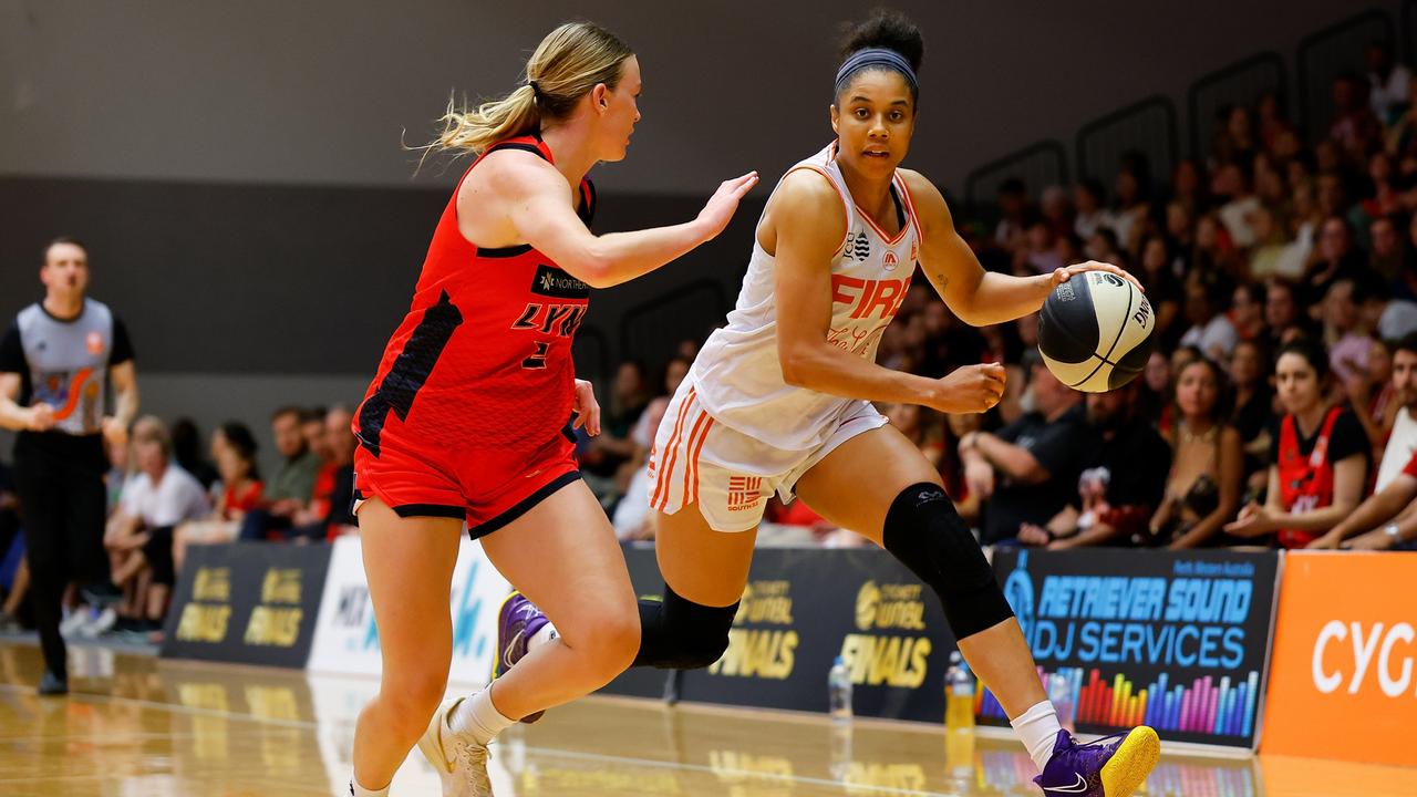 Nia Coffey of the Fire looks to get past Stephanie Gorman of the Lynx during game one of the WNBL Semi Final series between Perth Lynx and Townsville Fire at Bendat Basketball Stadium, on February 22, 2025, in Perth, Australia. (Photo by James Worsfold/Getty Images)