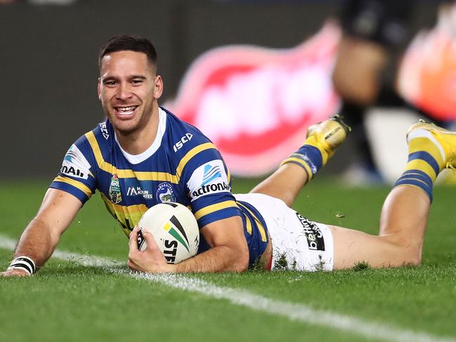 SYDNEY, AUSTRALIA - AUGUST 04:  Corey Norman of the Eels scores a try during the round 21 NRL match between the Parramatta Eels and the Gold Coast Titans at ANZ Stadium on August 4, 2018 in Sydney, Australia.  (Photo by Brendon Thorne/Getty Images)