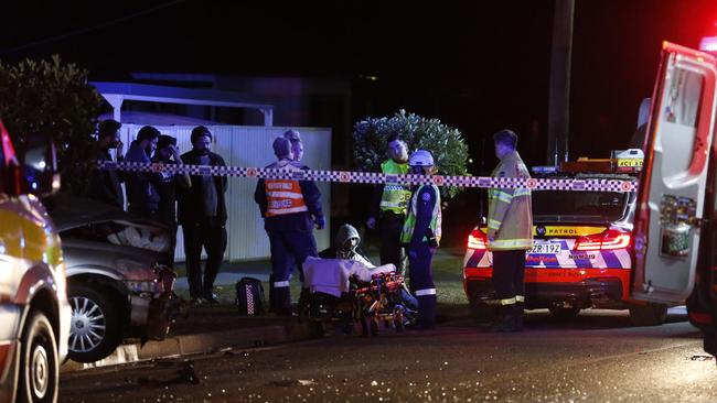 Harjinder Singh, 22, pictured in a hoodie at the scene of the fatal crash at the intersection of Crawford Rd and Coveny St, Doonside, on Saturday night. Picture: Steve Tyson/TNV