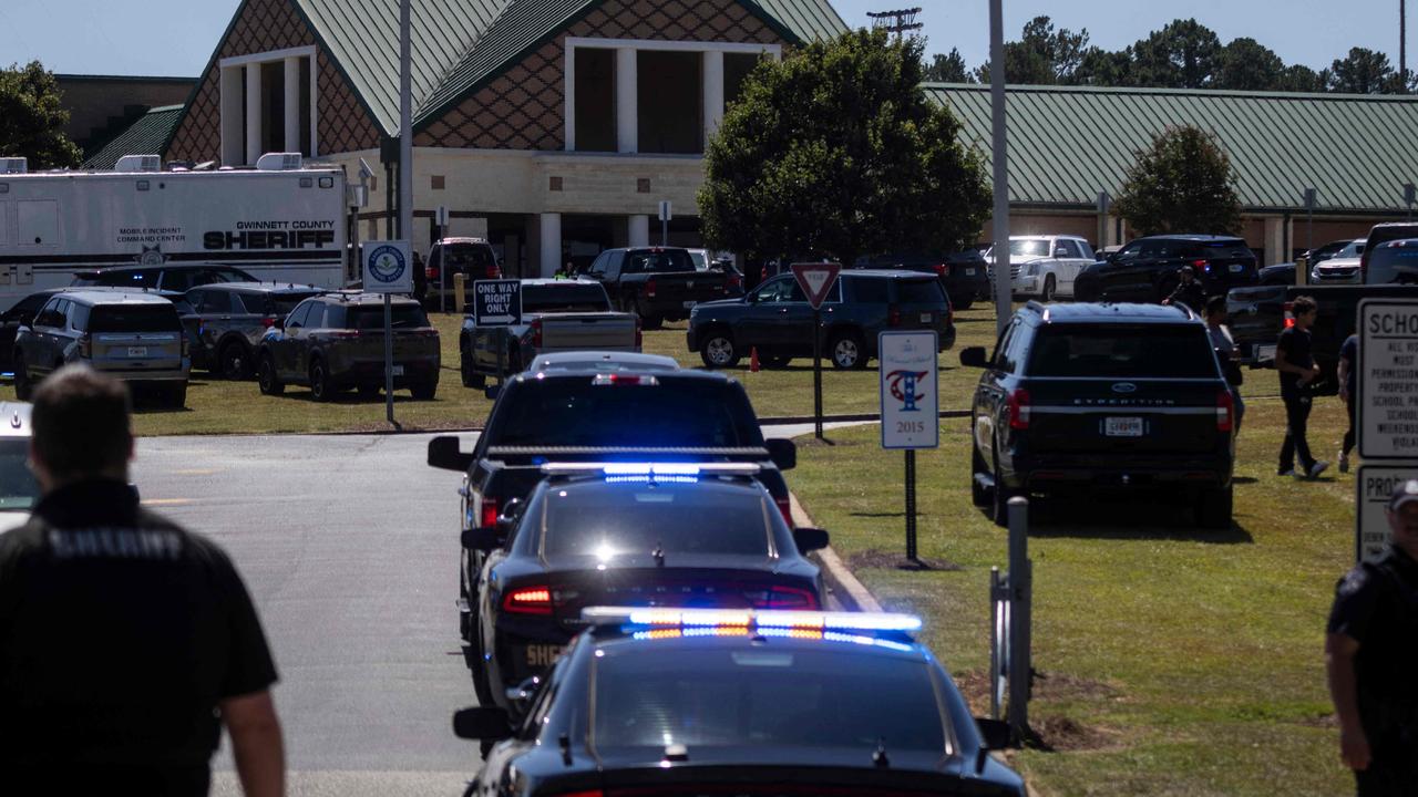 Law enforcement and first responders respond to Apalachee High School in Winder, Georgia. (Photo by CHRISTIAN MONTERROSA / AFP)