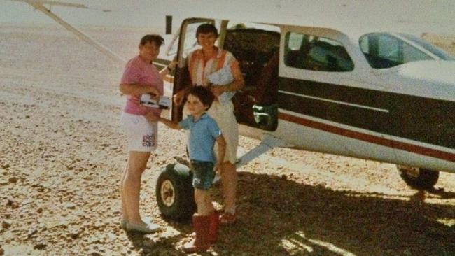 Morton as a boy with his mother Deb and the flying nun Sister Anne Maree Jensen on Mount Howitt Station airstrip, c1992-93.