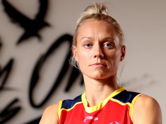 AFLW player Erin Phillips of the Adelaide Crows poses for a portrait at the Crows Headquarters at West Lakes in Adelaide, Thursday, December 12, 2019. Erin Phillips is looking to come back to play this season after a ACL injury in last years AFLW Grand Final. (AAP Image/Kelly Barnes) NO ARCHIVING