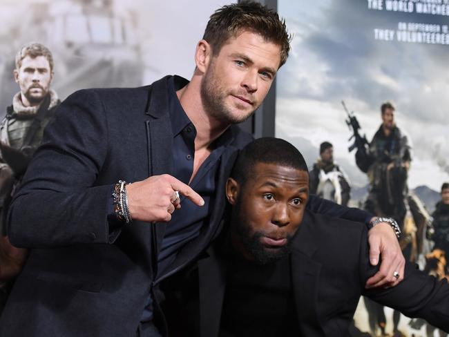 Chris Hemsworth and the man whose abs he is jealous of .. Trevante Rhodes. Picture: AFP