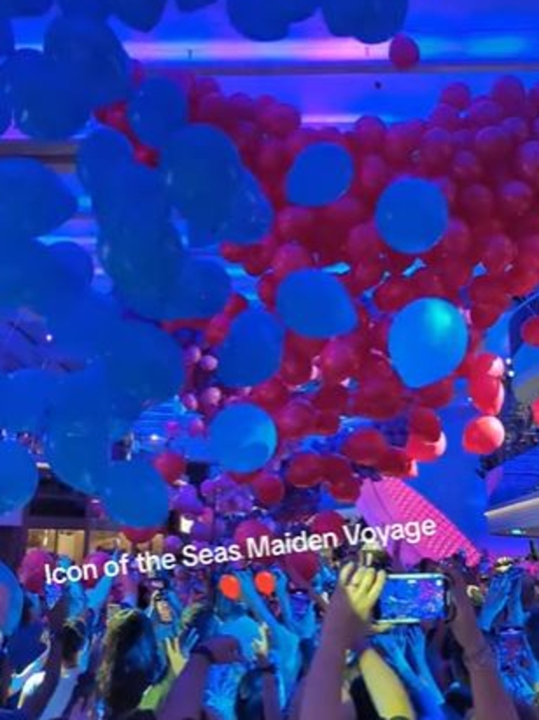 There was a balloon drop at midnight on the first night of the cruise. Picture: @cjsellshouses/TikTok