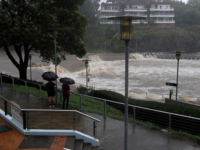 SYDNEY, AUSTRALIA - NewsWire Photos MARCH, 20, 2021: The banks of the Parramatta River are seen overflowing at the Charles St weir and ferry wharf, at Parramatta in Sydney. More rain is forecast for the NSW coast and other parts of the state over the weekend, with flood warnings in place and the Premier advising residents to stay home. Picture: NCA NewsWire/Bianca De Marchi