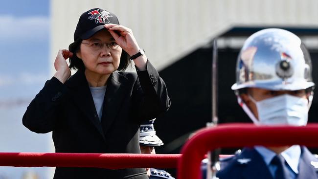 Taiwan President Tsai Ing-wen adjusts her cap during a ceremony at the Chiayi Air Base in southern Taiwan last week. Picture: AFP