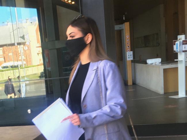 Julia Murphy leaves court after giving evidence in the committal hearing of Kynan Vital and Ethan Macpherson, who are accused of murdering her father.