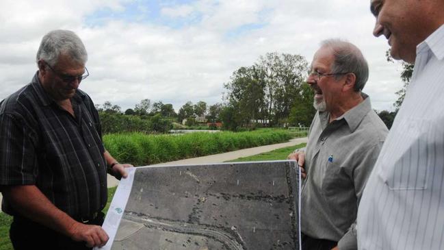 Beetroot farmer Peter Lerch, planner Lester Underdown, and growers rep Colin Dorber look at plans for the new cannery in the Lockyer Valley. Picture: Derek Barry