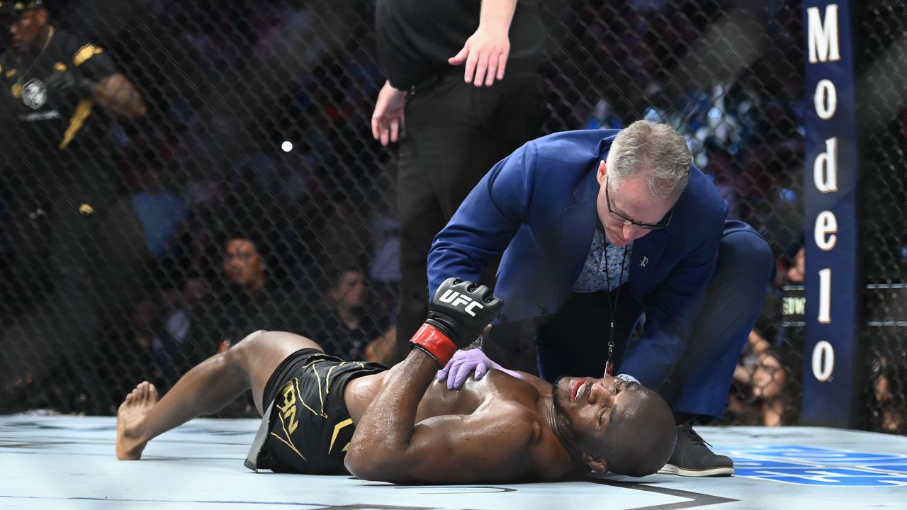 SALT LAKE CITY, UTAH - AUGUST 20: Kamaru Usman of Nigeria lays on the mat after being knocked out by Leon Edwards of Jamaica in a welterweight title bout during UFC 278 at Vivint Arena on August 20, 2022 in Salt Lake City, Utah. Alex Goodlett/Getty Images/AFP == FOR NEWSPAPERS, INTERNET, TELCOS &amp; TELEVISION USE ONLY ==