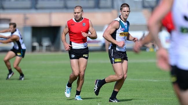 Kane Cornes and Hamish Hartlett are important members of Port Adelaide’s midfield group. Picture: Tricia Watkinson