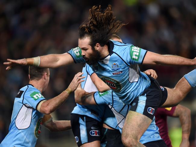 Aaron Woods of the Blues misses his teammates as he joins their celebration following a try scored by Michael Jennings during the State of Origin Game III between the NSW Blues and Queensland Maroons, at ANZ Stadium in Sydney on Wednesday, July 13, 2016. (AAP Image/Paul Miller) NO ARCHIVING, EDITORIAL USE ONLY