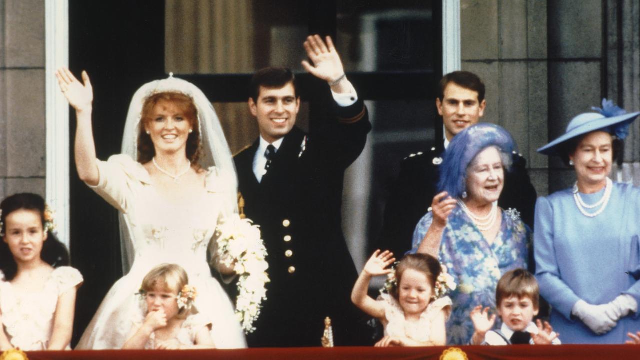 The newlyweds with the Royal Family on their wedding day in July, 1986. Picture: Stringer/PA/AFP