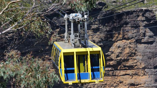 The Scenic Skyway gives you views of Katoomba Falls, the Three Sisters and Jamison Valley.