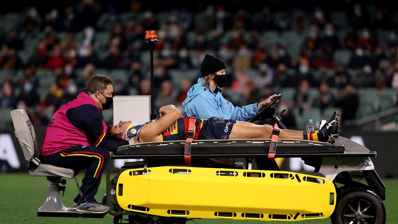 Will Hamill of the Crows is stretchered off during Showdown 50. Picture: Getty Images