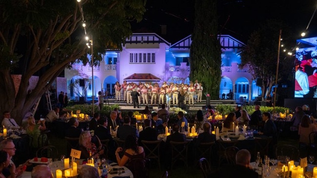 Staff choir at the soiree.