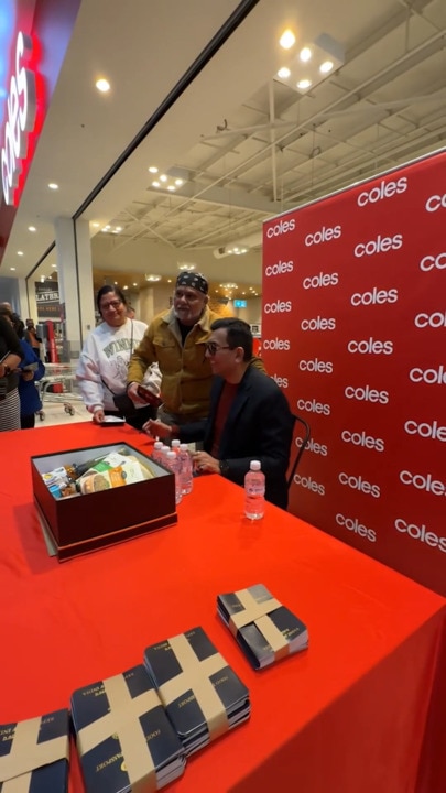 Chaos at Coles as fans turn out for global star