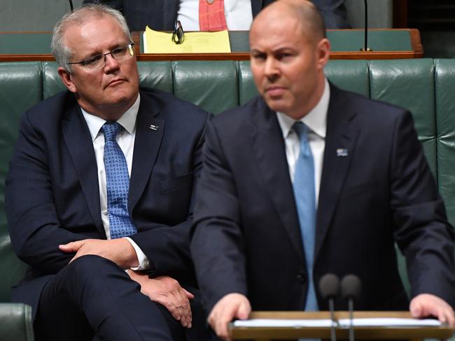 Prime Minister Scott Morrison and Treasurer Josh Frydenberg, pictured delivering the Federal Budget in the House of Representatives. Picture: Getty Images