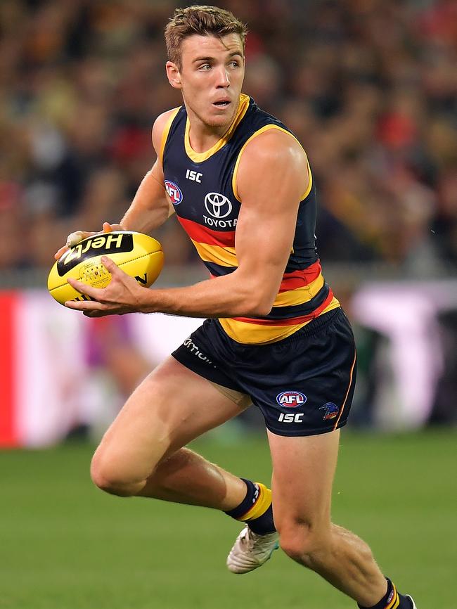 Adelaide Crow Paul Seedsman looks for options against Gold Coast at Adelaide Oval. Picture: Daniel Kalisz/Getty Images