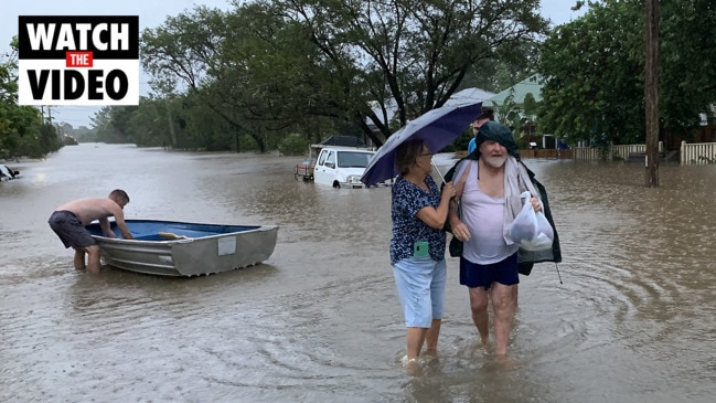 Communities rally after record floods hit