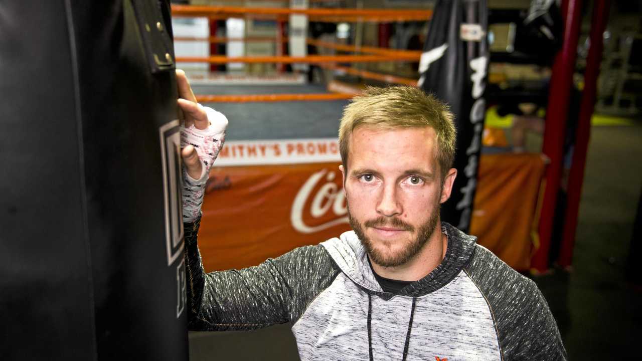 HANGING UP GLOVES: Toowoomba boxer Kris George has called time on his professional career. Picture: Nev Madsen