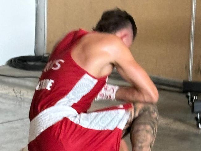 Australia's Harry Garside breaks down after being defeated by Hungary's Richard Kovacs in the 63.kg boxing. Picture: Peter Badel