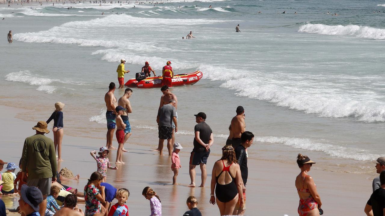 Hundreds of people flocked to the beaches to celebrate Australia Day at Burleigh beach. Picture: Tertius Pickard