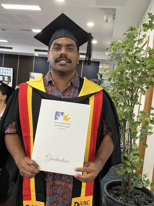 Joel Denduck graduates with a Bachelor of Primary Education.