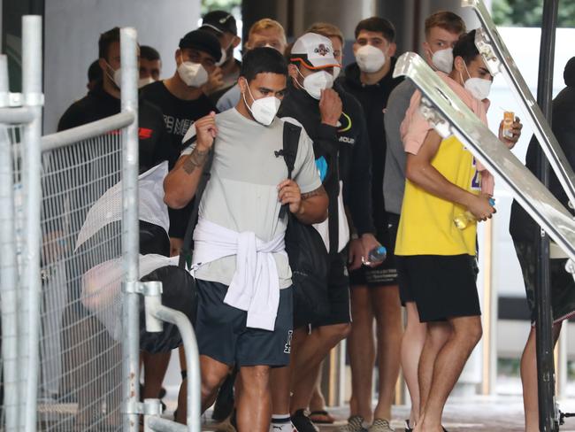 Joe Ofahengaue and his Wests Tigers teammates arrive at their hub at the Novotel. Picture: Annette Dew