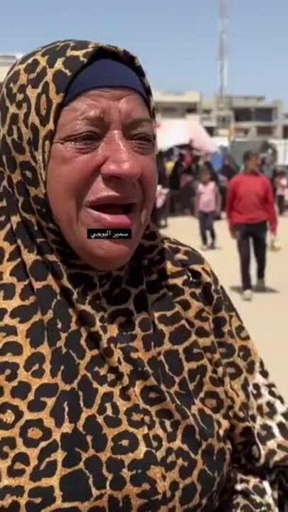 'Killing Us Would Have Been Less Cruel': Gaza Man Struggles to Push Boy in Wheelchair