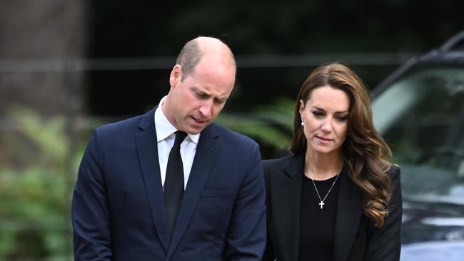 KING'S LYNN, ENGLAND - SEPTEMBER 15: Prince William, Prince of Wales and Catherine, Princess of Wales view floral tributes at Sandringham on September 15, 2022 in King's Lynn, England. The Prince and Princess of Wales are visiting Sandringham to view tributes to Queen Elizabeth II, who died at Balmoral Castle on September 8, 2022. (Photo by Samir Hussein/WireImage)