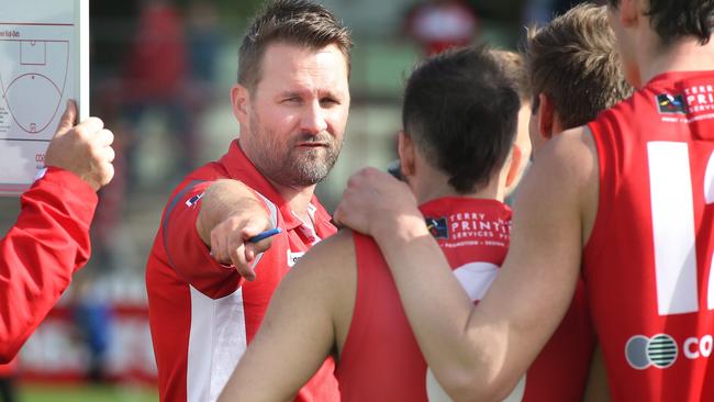 North Adelaide coach Jacob Surjan lays down the law to his charges. Picture: Dean Martin